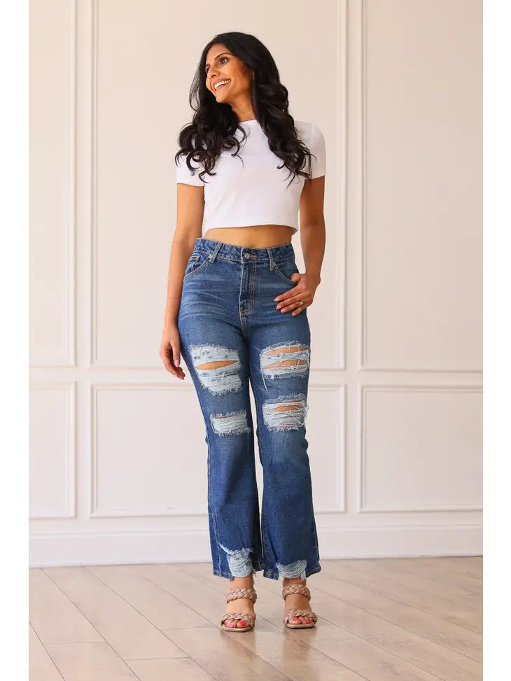 Blake Mid Washed Mid Rise Distressed Crop Flare